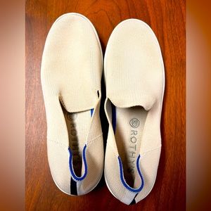 Cream and White Rothy’s Slip Ons